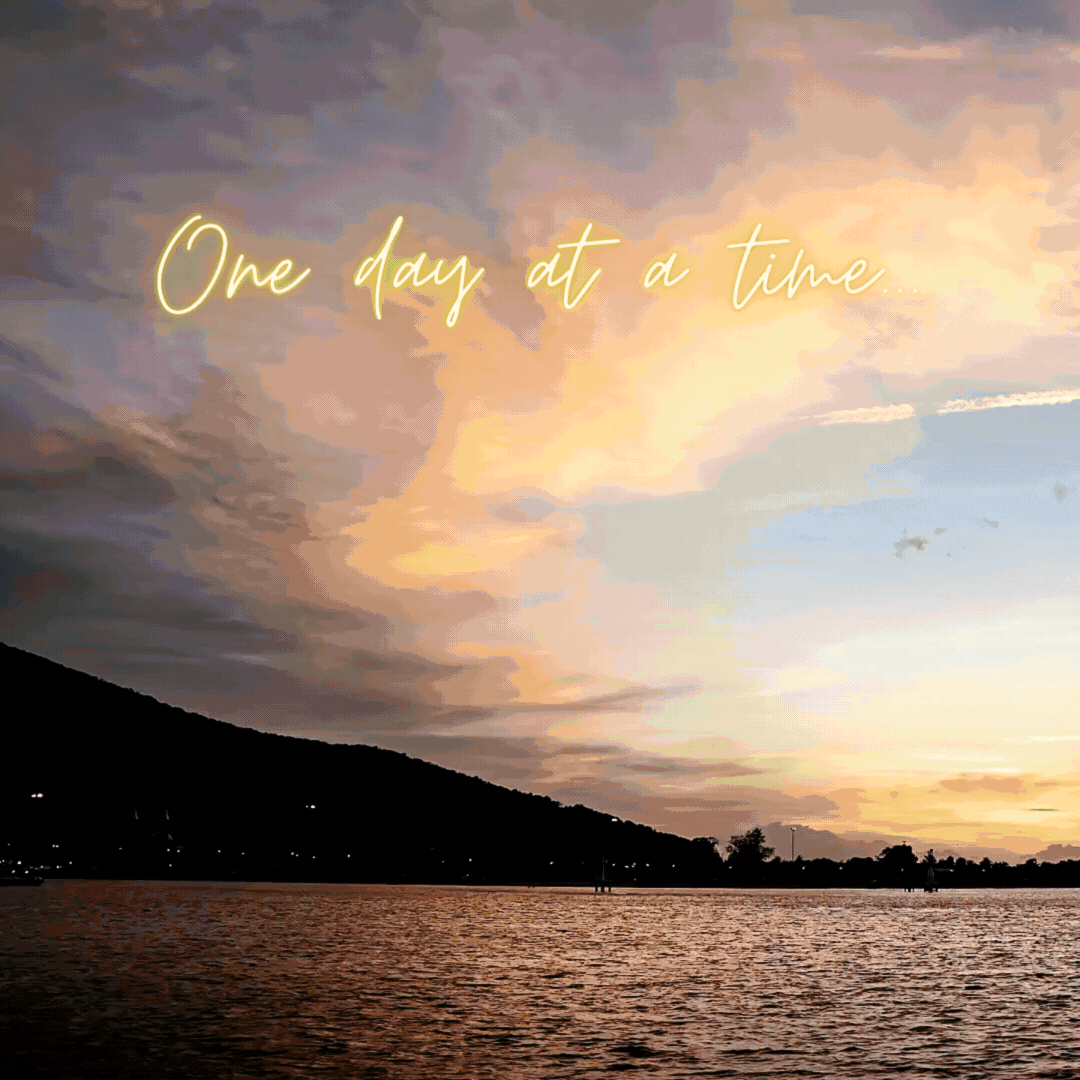 clouds moving over a beach at dawn